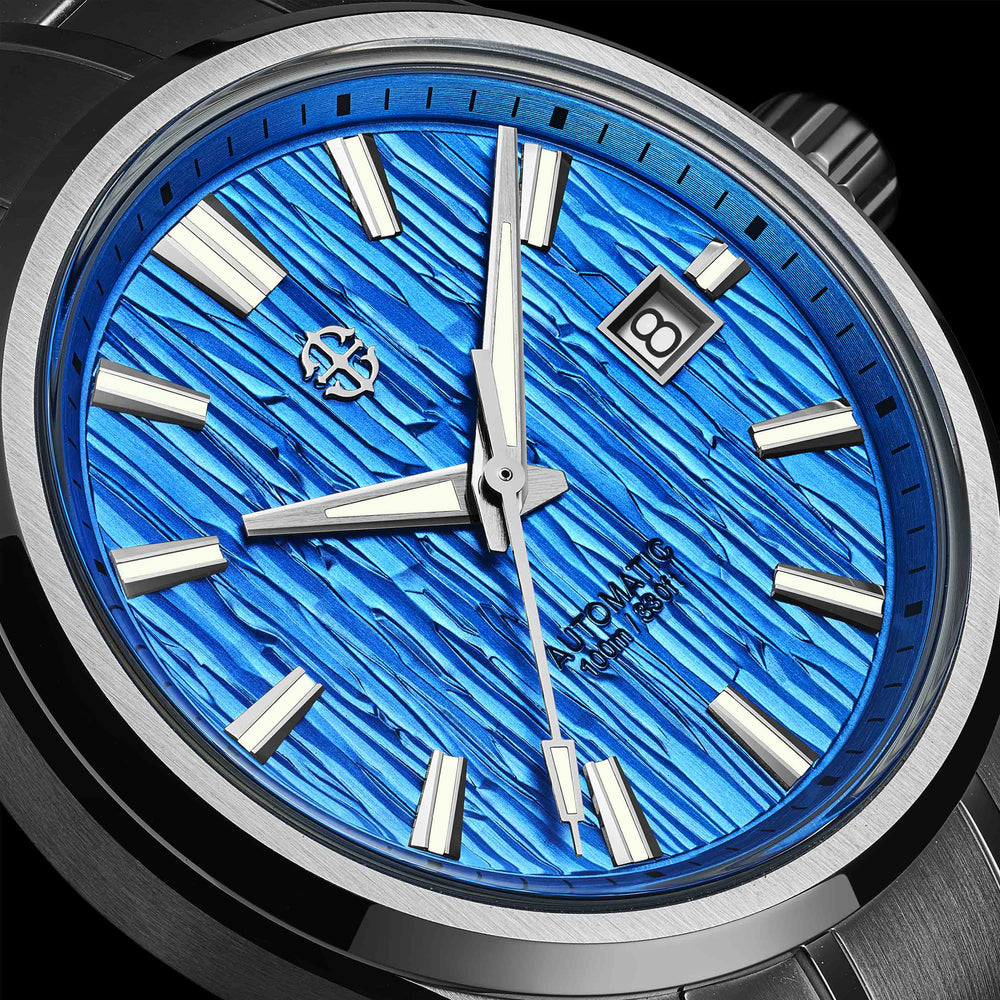Close-up of the embossed blue texture of an AETHELSOHN Glacier watch